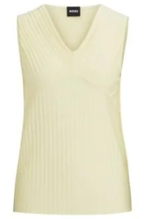 Sleeveless jersey top with V neckline and plissé pleats 