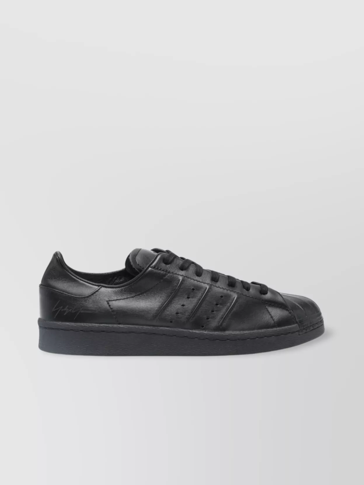 Y-3   Leather sneakers with round toe and stripes